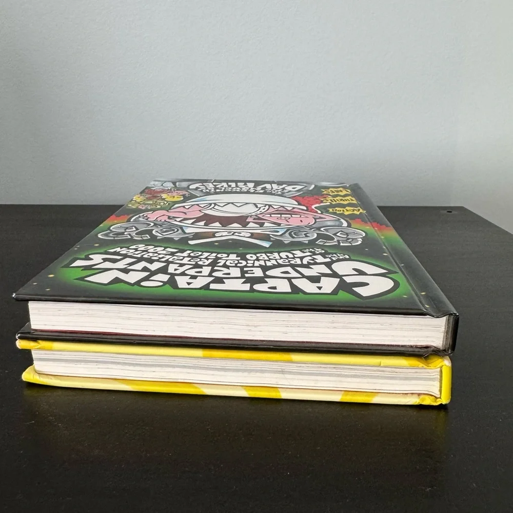 2 Captain Underpants hardcover books by Dav Pilkey. Tyrannical Revolting Revenge